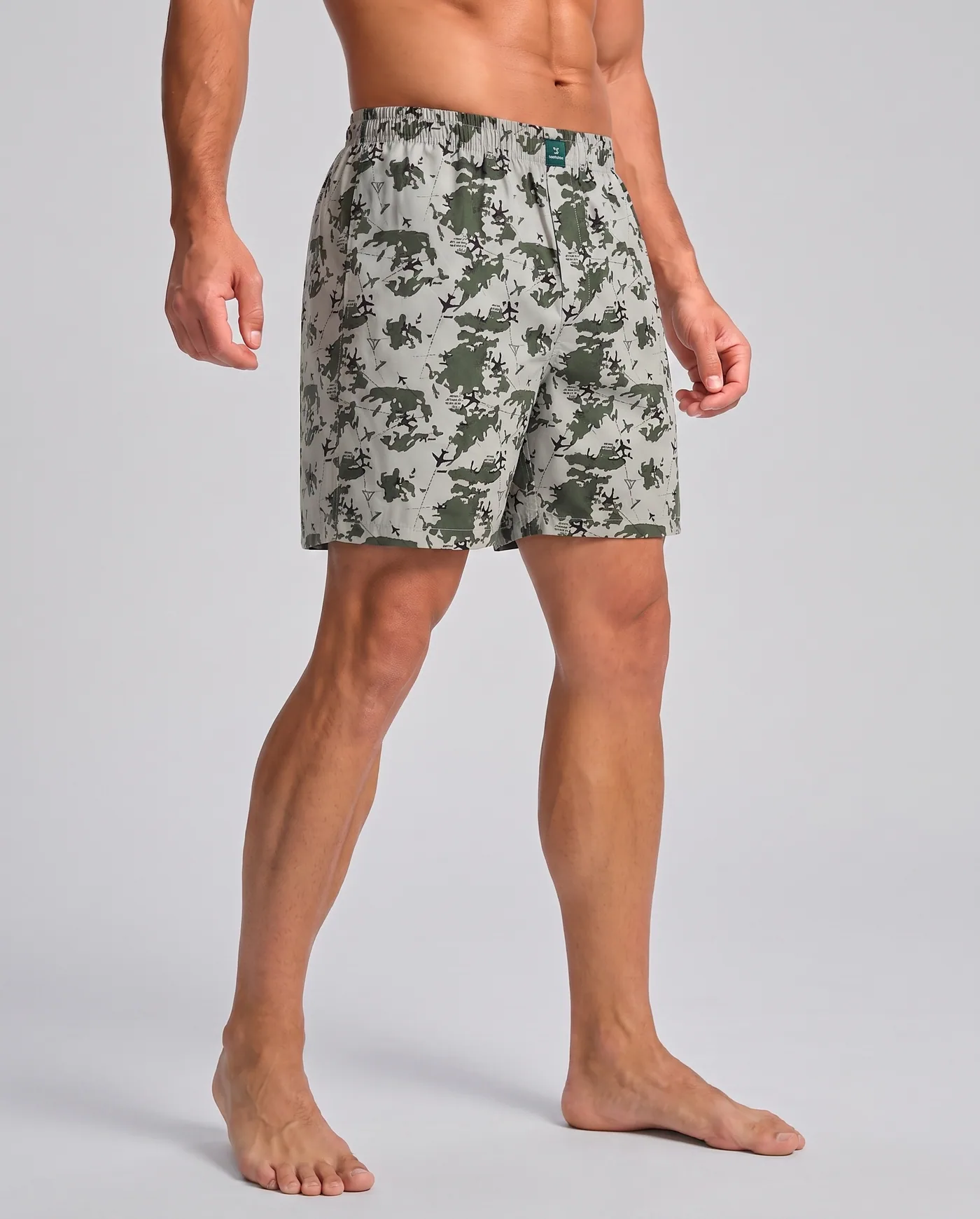 Model wearing Recon Aero Camo printed boxer shorts, full length view